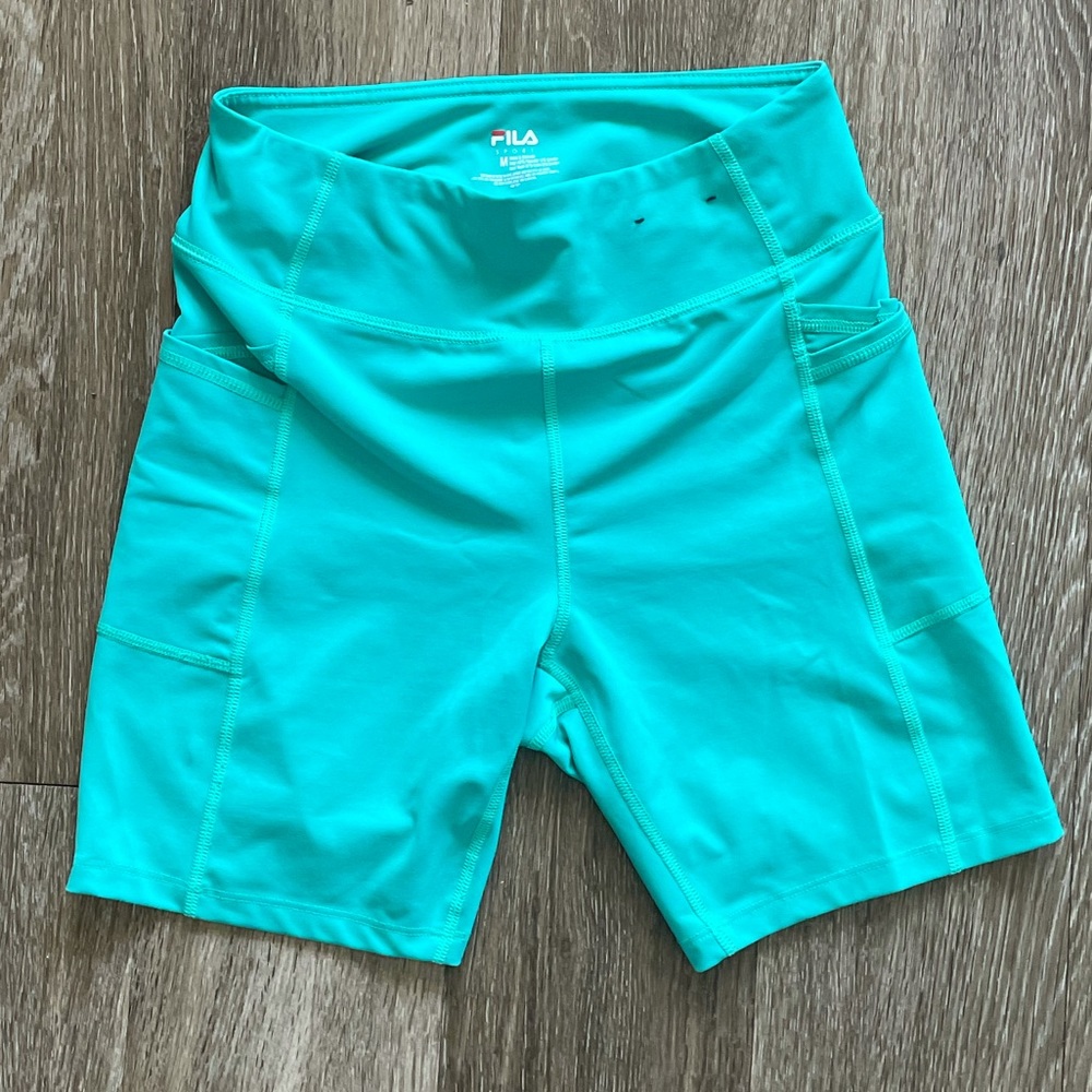 Turquoise biker shorts with pockets